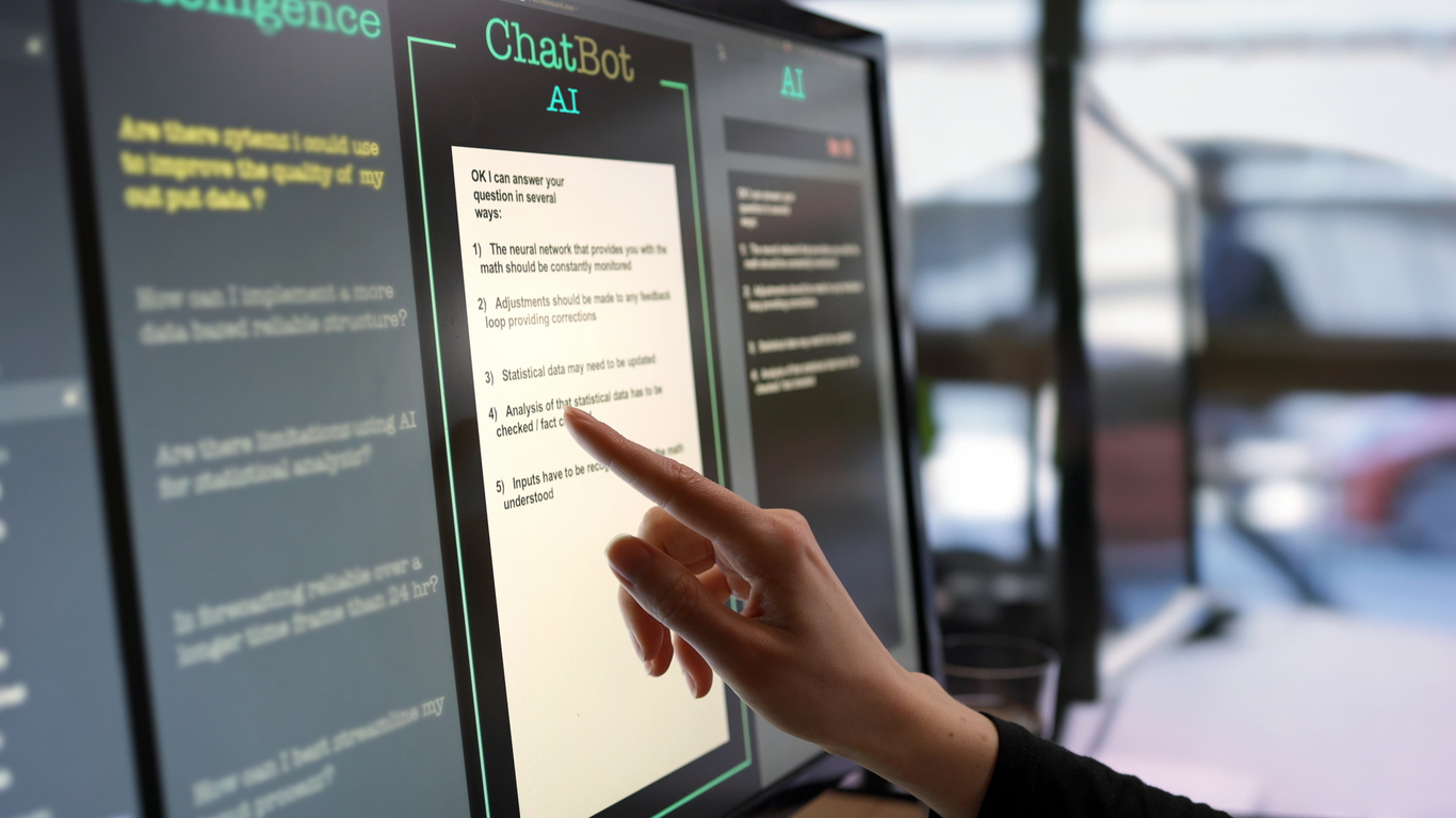 Researcher interacting with an AI chatbot interface during evaluation